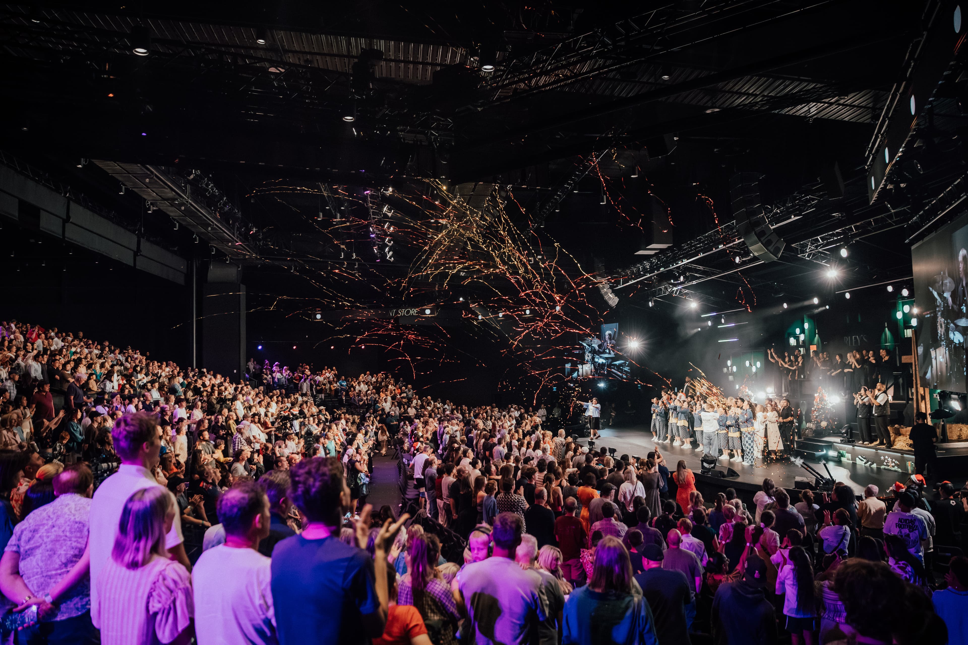 Christmas Spec from right side of the auditorium showing the audience and confetti falling from the ceiling
