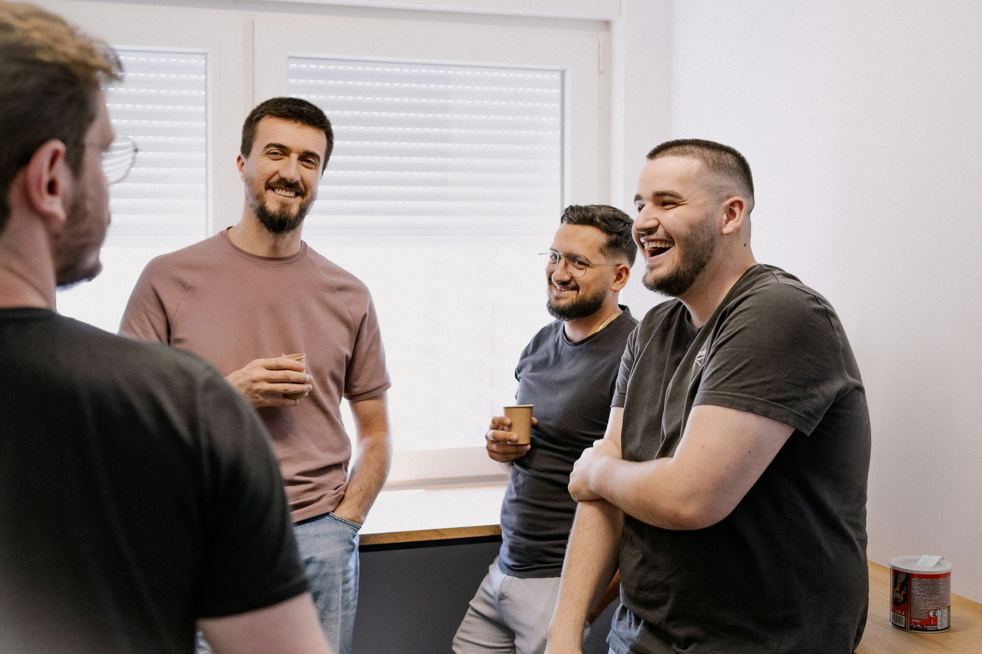 Guys talking and laughing with each other