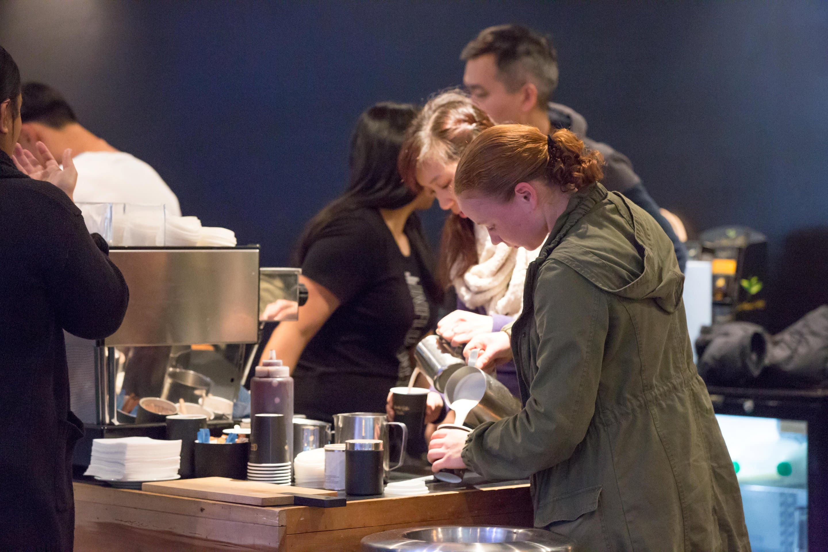 Someone pouring a coffee.